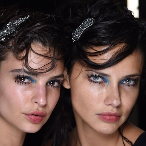 Models wearing dramatic makeup for Marc Jacob's Fashion Week show