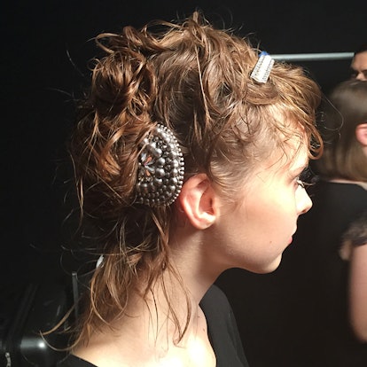 '40s inspired updo with bedazzled hair clips