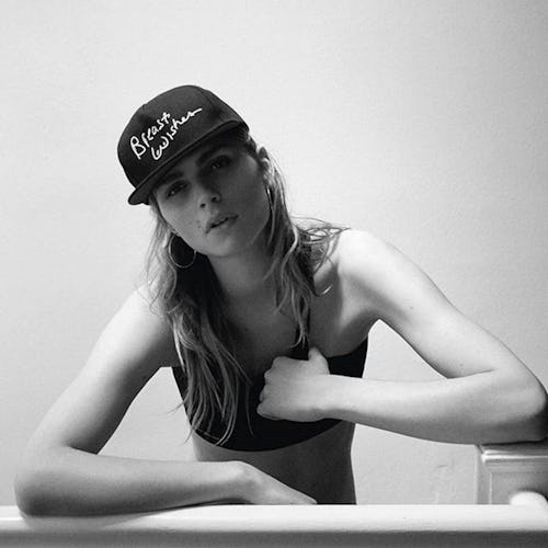 A portrait of transgender model Andreja Pejic in a black top