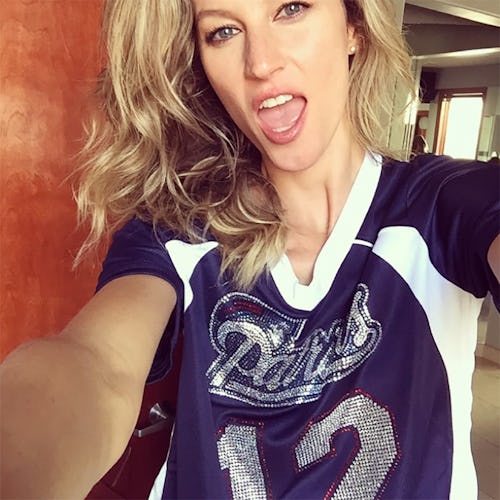 Gisele Bundchen in a navy-white shirt ready to host a great football party