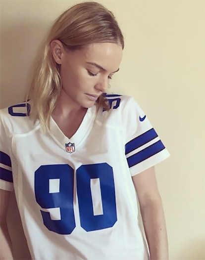 Kate Bosworth posing in a football jersey with the number 90