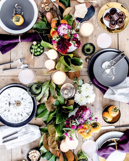 A large variety of food on a decorated dining table during Holiday season