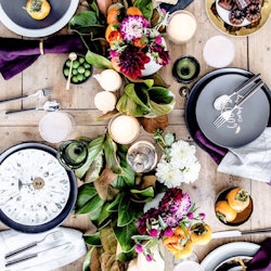 A large variety of food on a decorated dining table during Holiday season