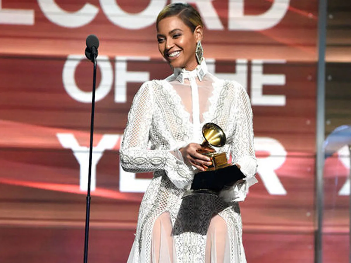 beyonce red carpet white dress Beyonc Makes Surprise Appearance at Grammys in Daring Gown