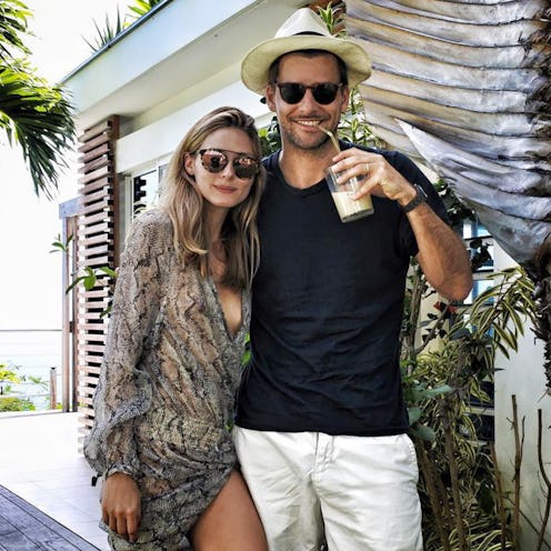 A man and a woman posing for a picture at one of the 5 most luxurious spa treatments for 2