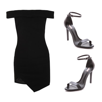 A black mini dress and silver sandals on a white background 