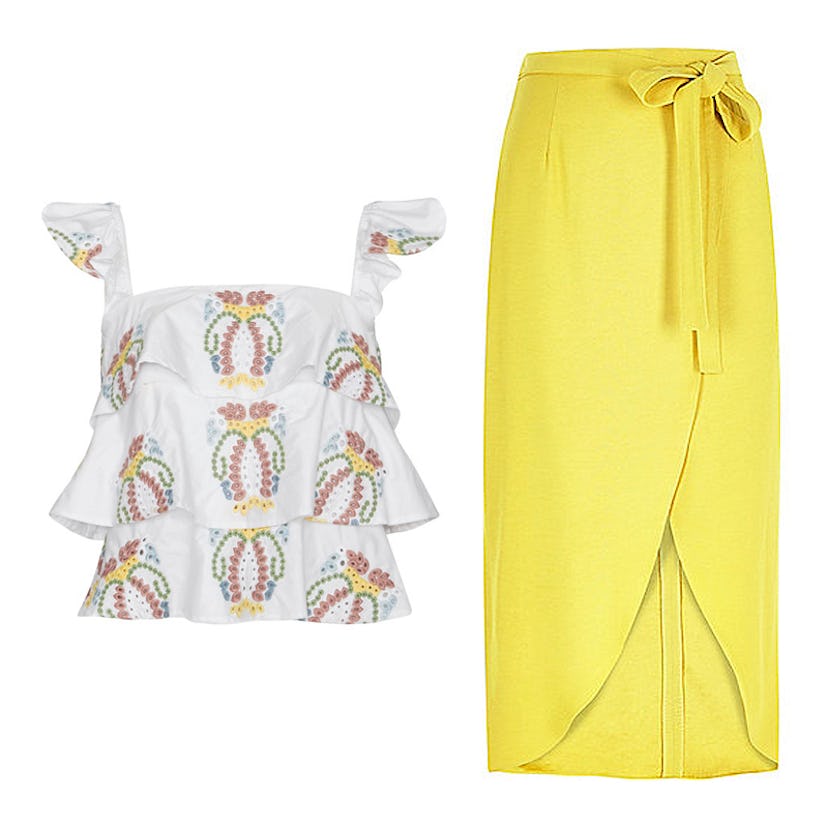 A yellow skirt and a white top on a white background 
