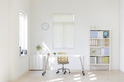Simple and chic home office with natural light.