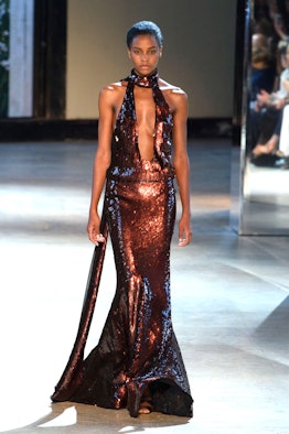 A model wearing Alexandre Vauthier sequined gown from their Fall 2016 Couture Show