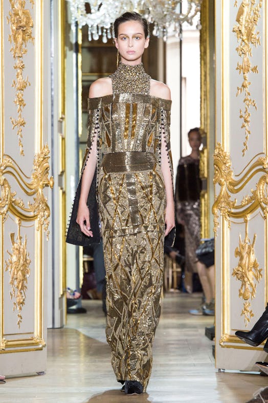 A model wearing J. Mendel golden gown from their Fall 2016 Couture Show