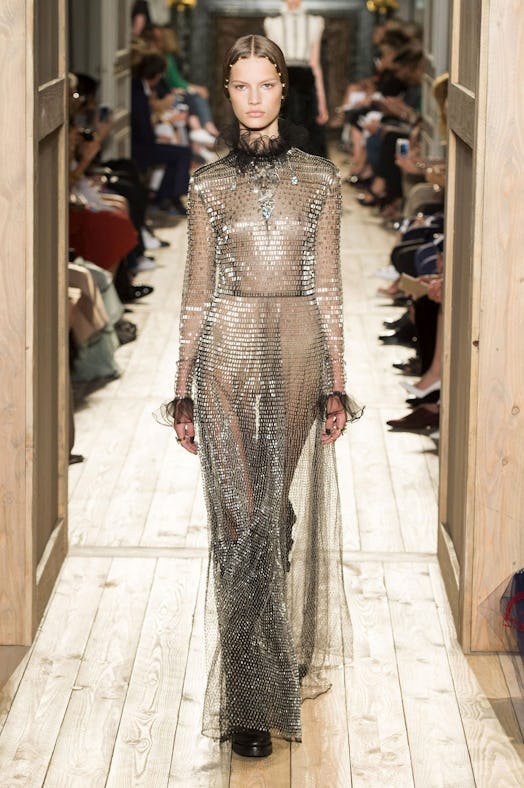 A model wearing Valentino sheer maxi gown from their Fall 2016 Couture Show