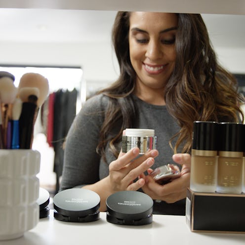 A young lady looking at skincare products in a shop