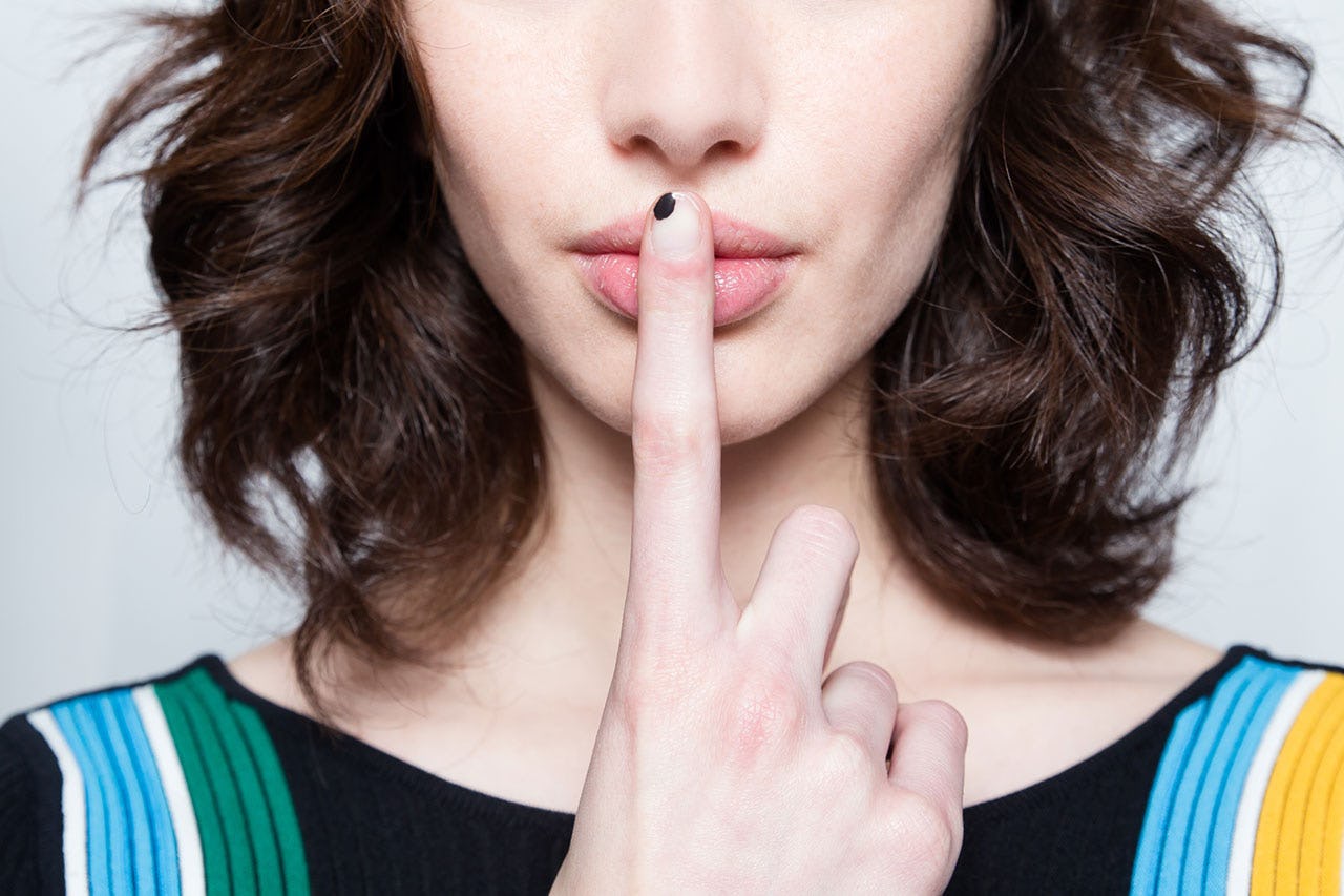 A woman after getting a non-invasive lip-plumping treatment