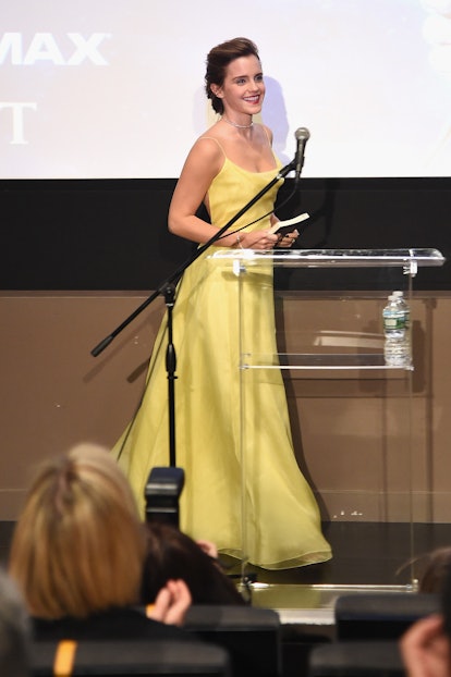 Emma Watson wearing a Dior yellow dress.