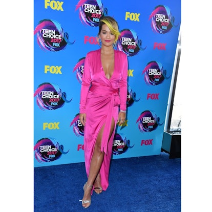 Rita Ora posing in a pink dress at the Teen Choice Awards 2017