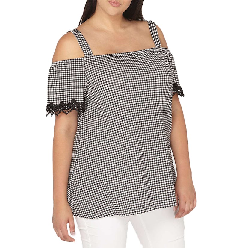 A lady posing in a lace Gingham Bardot top