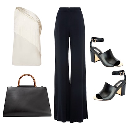 A black tote, a white top, black tops, and black heel sandals 