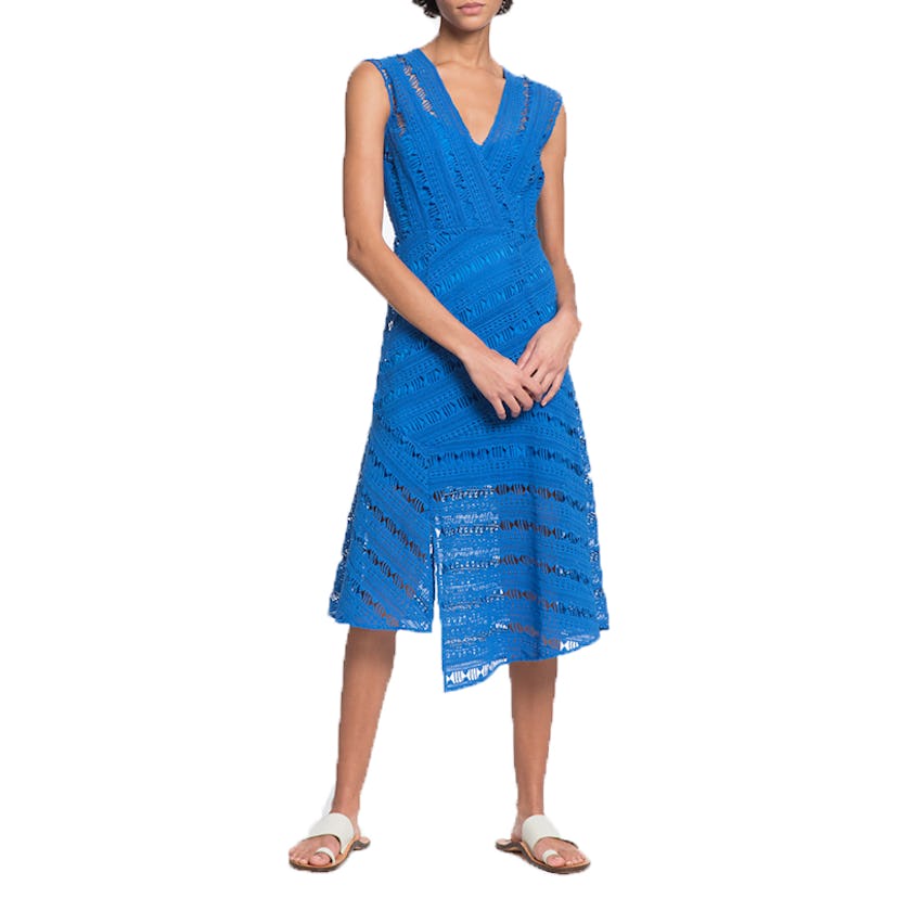 Young lady posing in an inclusive blue Surplice dress