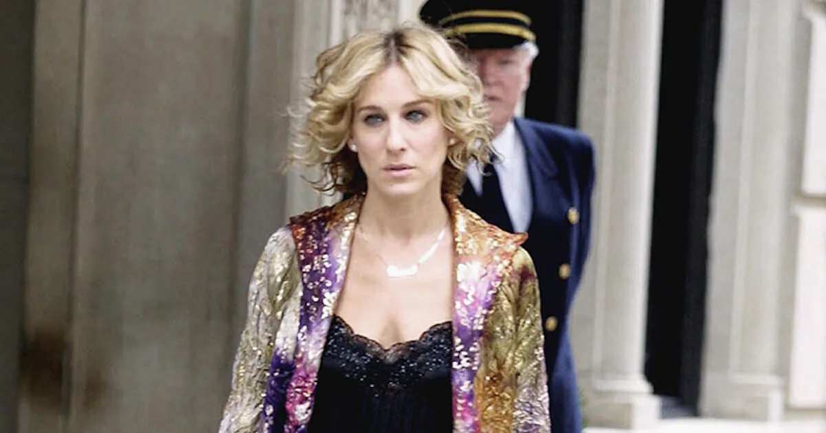 carrie bradshaw purple dress And Just Like Thathere's how I spent my Thursday. So happy my favorite femme fatales are back! And I actually have two iconic Sex & The City dresses in the shop. 1