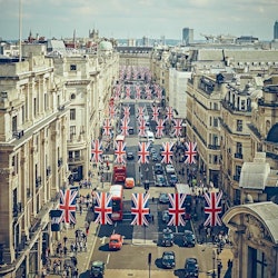 The view at London with the United Kingdom flags all around the city