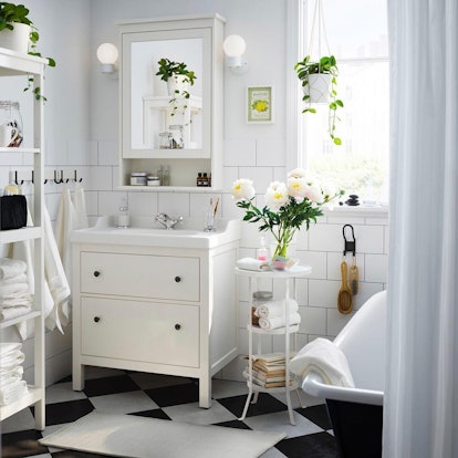 A white bathroom equipped with Ikea furniture 