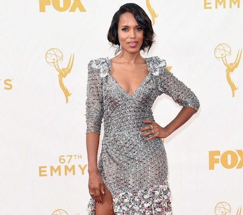 Kerry Washington posing on a red carpet in a short silver sequin dress