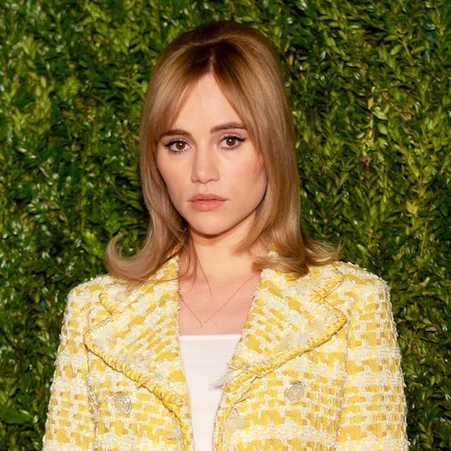 Suki Waterhouse in a yellow chanel coat, white top and a skirt at the nyc dinner