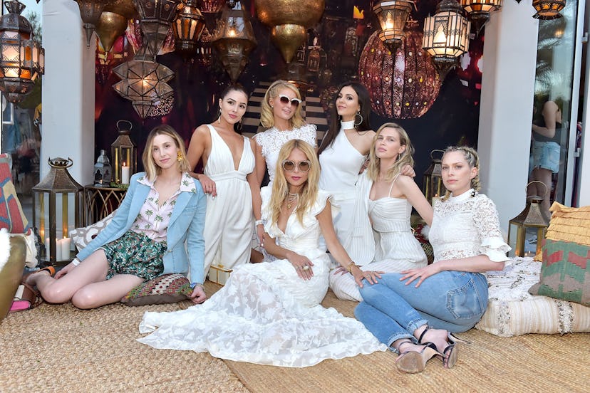Seven women posing for a photo at the 2018 ZOEasis Party