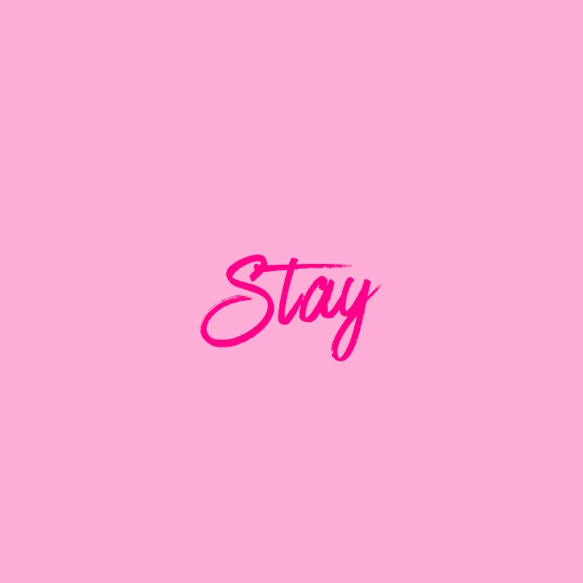 "Stay" text sign on a pink background