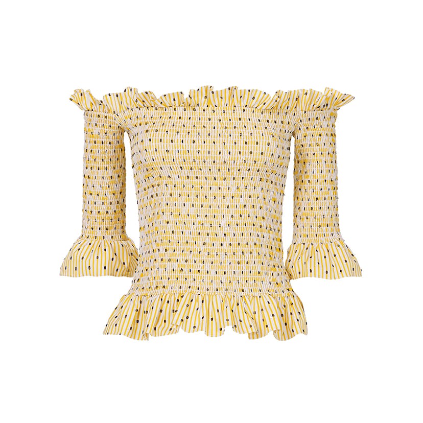 Caroline Constas Calida yellow smocked top on a white background 