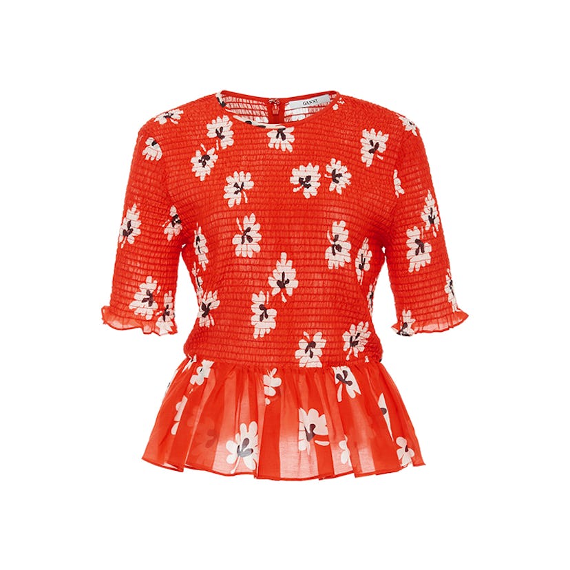 Linaria red floral smocked peplum cotton-blend top on a white background
