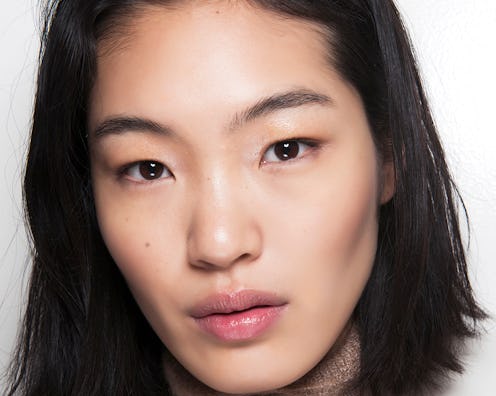 Asian model promoting face cleansers perfect for every beauty routine.