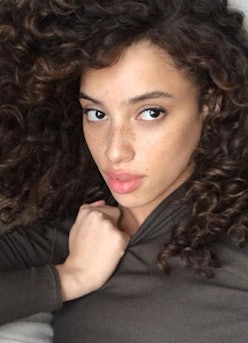 Khadijha posed selfie with curls and freckles