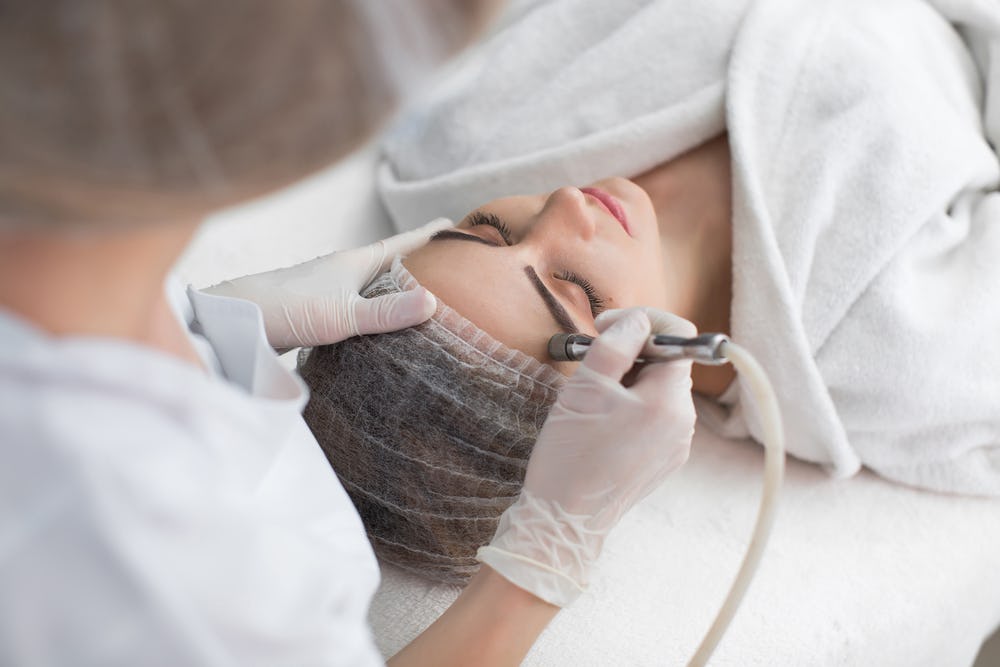 Everything You Need To Know About Facial Extractions — Including The