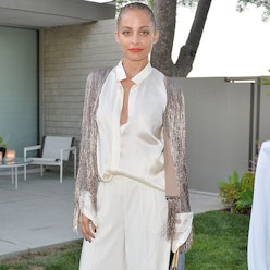 Nicole Richie in a 70s-inspired trend outfit, a cream silk-sequin top and pants