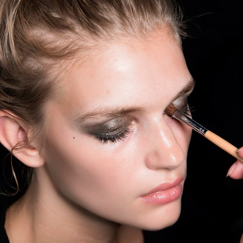 A model getting her make-up done with clean makeup tools