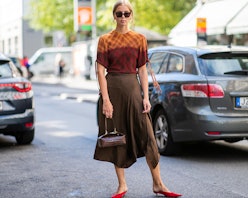 A woman on the street wearing a dress in trend