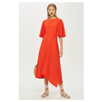 Cut About red midi dress worn by a female model