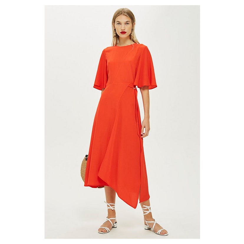 Cut About red midi dress worn by a female model
